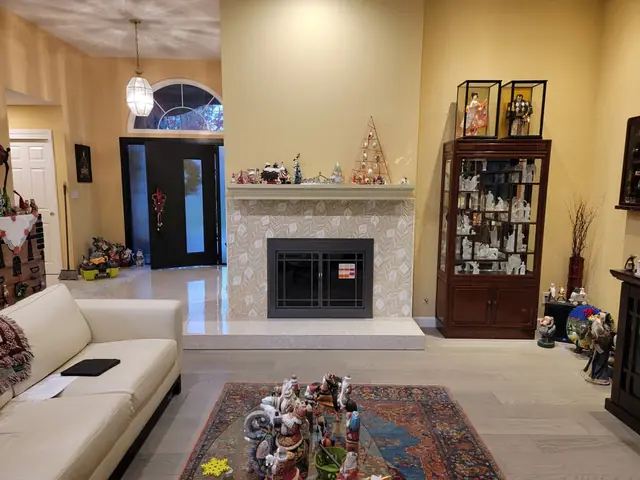 Alamo living room with the remodeled fireplace and mantel
