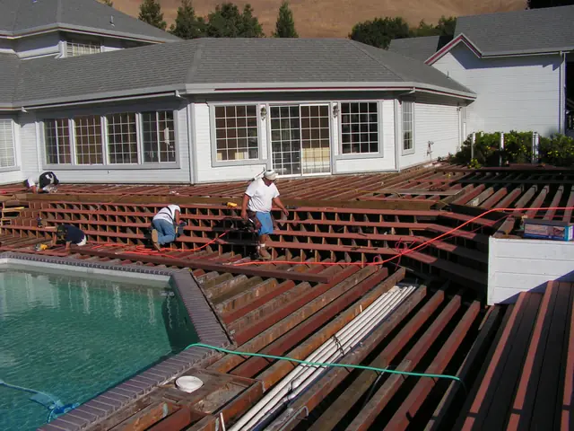 Crew building the new deck framing by the pool in Danville