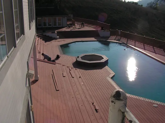 Composite decking going in around the pool in Danville