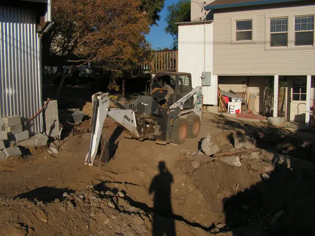 Back yard makeover under way, old landscape being dug out