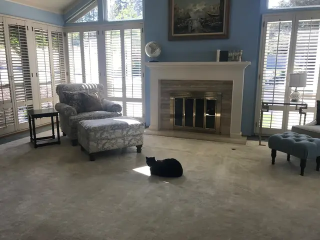The living room and fireplace before the face-lift