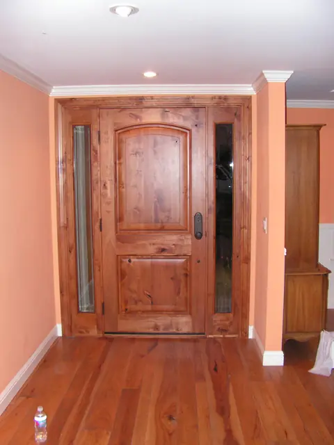 New wood entry door with a sidelight in a Danville home