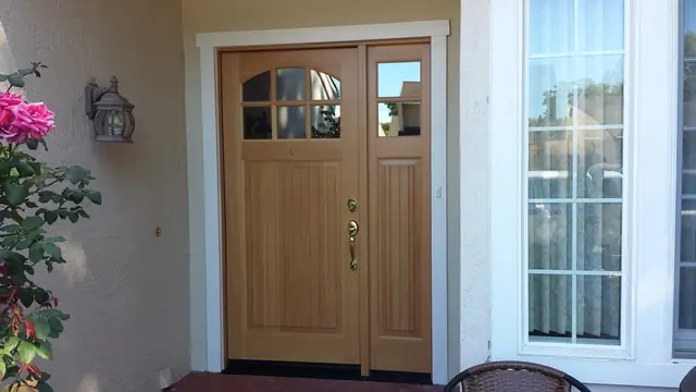 New wood front door with glass panels at a Pleasanton home