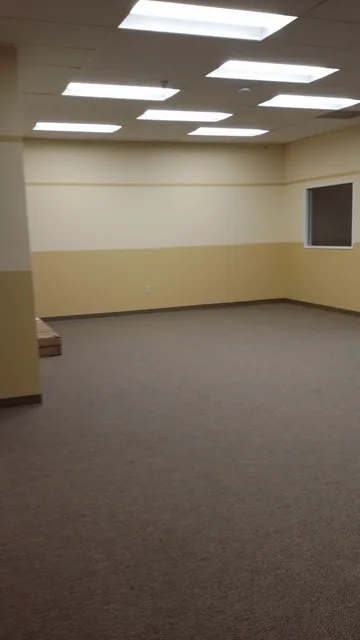 After: two-tone painted classroom with new carpet at Huntington Learning Center in Danville
