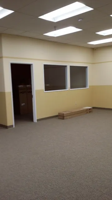 After: finished room with interior windows into the next classroom, Huntington Learning Center, Danville