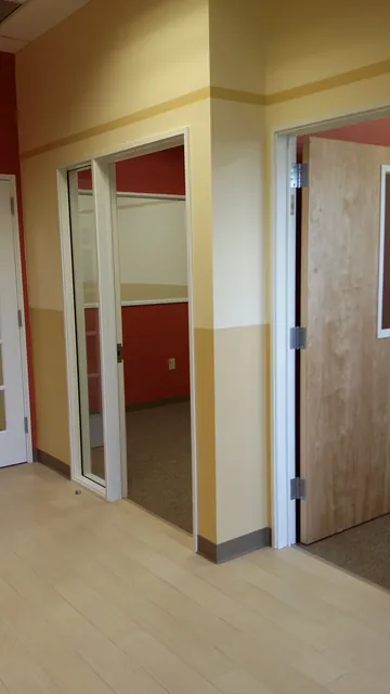 After: glass-front rooms and new doors off the hallway at Huntington Learning Center in Danville