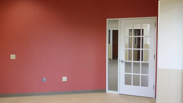 After: red accent wall and French doors at Huntington Learning Center in Danville