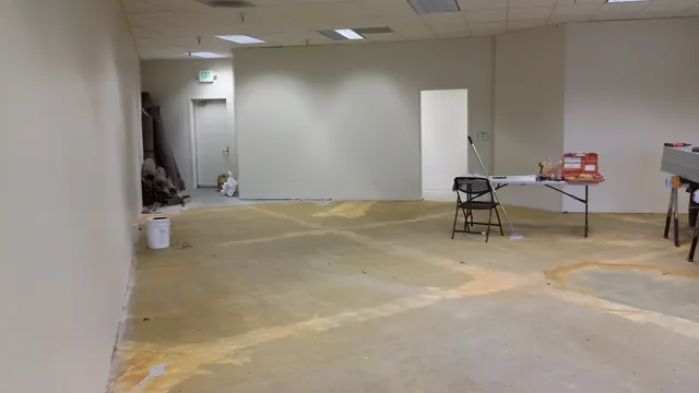 Before: the open shell of the future Huntington Learning Center, floor stripped to the slab