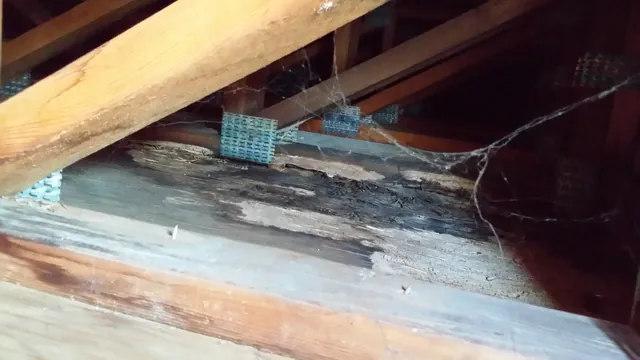 Before: rotted, water-damaged framing under the Manteca apartment walkway