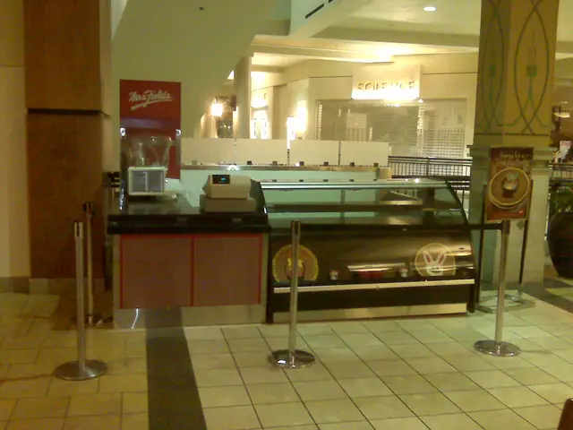 The updated Mrs. Fields kiosk in the Valley Fair Mall food court, counter and cookie case