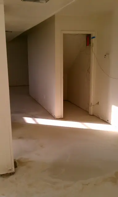 Office suite in the San Leandro building during the tenant improvement, walls and floor prepped