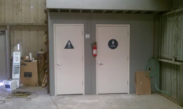 Restroom doors in the San Leandro office building