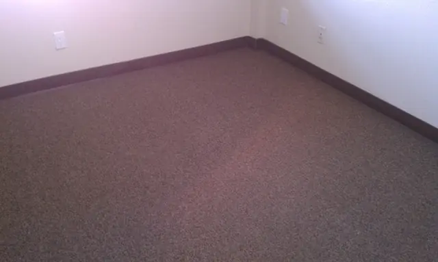 Office with new carpet and fresh paint in the San Leandro office building tenant improvement