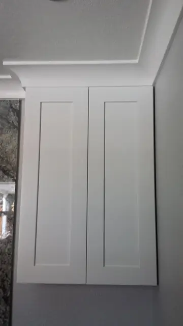 White storage cabinet in the remodeled San Ramon bathroom