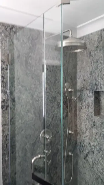 Glass shower with granite walls in the San Ramon bathroom remodel
