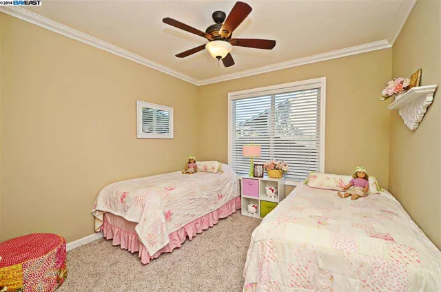 Second bedroom with a ceiling fan in the San Ramon whole-home remodel