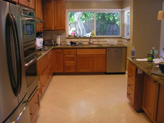 San Ramon kitchen remodel, wall ovens and cabinets along the tile floor