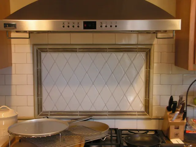 Diamond-pattern tile backsplash under the range hood, San Ramon kitchen